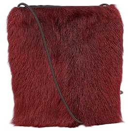 Prada Mini borsa a tracolla e crossbody in nylon nero con logo sport in pelliccia rossa