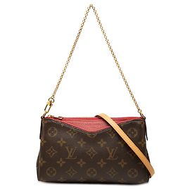 Clutch Louis Vuitton Brown Monogram Pallas