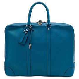 Louis Vuitton Porte Documents Voyage in pelle di vitello martellata blu