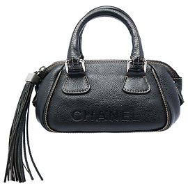 Chanel LAX Bowler Bag aus schwarzem genarbtem Kalbsleder mit Quaste