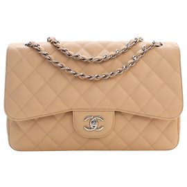Chanel Beige Jumbo Classic Caviar Double Flap