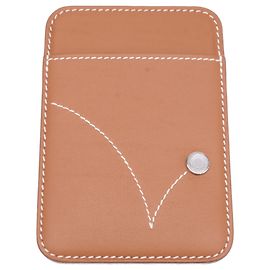 Hermès Porta-cartões de couro Swift dourado Hermes