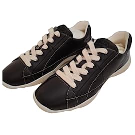 Prada Re-Edition Sneaker aus schwarzem Leder