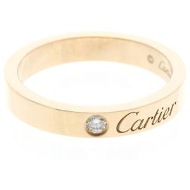 Anello nuziale C de Cartier con diamante in oro rosa