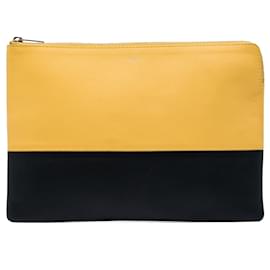 Celine Solo Clutch aus zweifarbigem Leder in Gelb - Céline