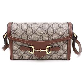 Gucci Mini borsa a tracolla e crossbody in tela GG Supreme Horsebit