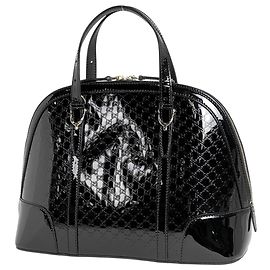 Gucci Microguccissima Handtasche aus schwarzem Lackleder