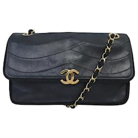 VINTAGE CHANEL RABAT LOGO CC BORSA A MANO IN PELLE NERA