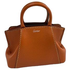 Cartier Mini-Handtasche aus orangefarbenem Leder