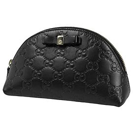 Beauty case in pelle nera Gucci