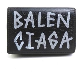 Cartera tríptico en cuero negro Balenciaga