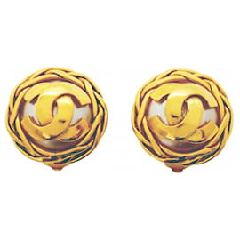Orecchini a clip dorati Chanel con logo Coco