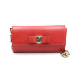 Salvatore Ferragamo Mini clutch vermelha com laço e bolsa de ombro com corrente dourada