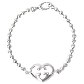 Bracciale in argento con cuori intrecciati - Gucci