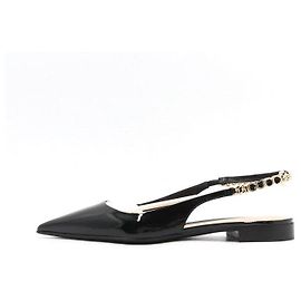 Gucci Goldenes Logo Lacklederschuhe für Damen flach