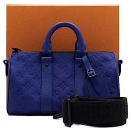 Bolso Bandolera y Tote Bag Keepall en Taurillon Monogram Azul - Louis Vuitton