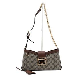 Gucci Piccola borsa a tracolla con catena dorata
