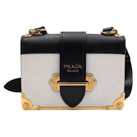 Prada Borsa a tracolla City in pelle con borchie logo dorate