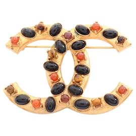 Spilla Chanel Coco Mark placcata oro