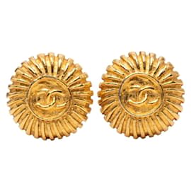Orecchini tondi con logo Coco Chanel placcati in oro