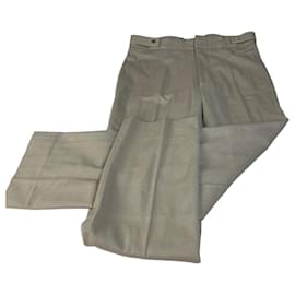 Pantalones vintage Gucci de viscosa beige con botones dorados M