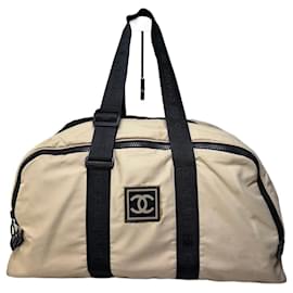 Vintage Chanel Duffle Bag Beige Schwarz aus Polyester mit Lederakzenten