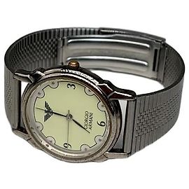 Vintage Giorgio Armani Uhr aus Edelstahl mit silbernem Mesh-Armband und gelbem Zifferblatt