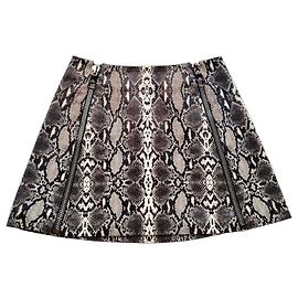 Neil Barrett Minifalda evasé de piel estampado de serpiente