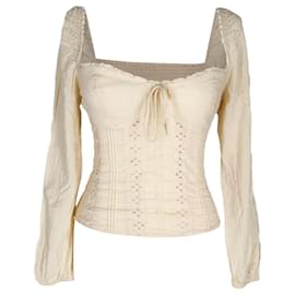 Top Isadora de Reformation en viscosa beige