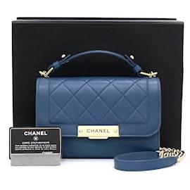 Chanel Piccola borsa a manico Label Click in pelle di vitello blu navy con catena dorata e tracolla