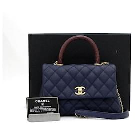 Piccola borsa a patta Navy Caviar Coco Handle in lucertola con manico superiore e borsa a tracolla con catena dorata - Chanel