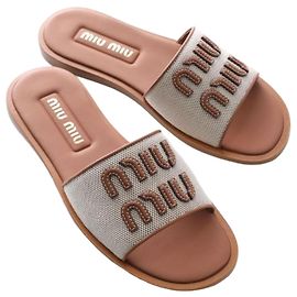 Miu Miu Sandalias de lona y cuero