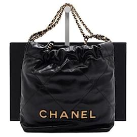 Chanel Mini borsa a tracolla e borsa crossbody in metallo dorato
