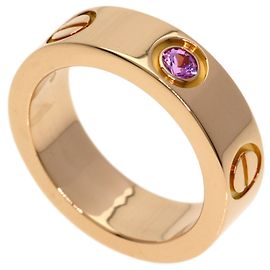 Cartier Love Ring aus 18K Roségold mit Saphir