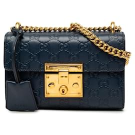 Bolso de hombro con cadena y candado Gucci Guccissima
