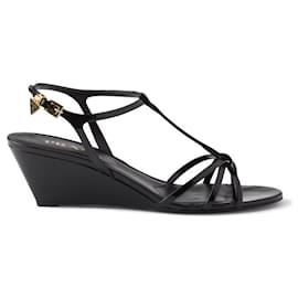 Prada Sandali con zeppa in vernice nera Triangle