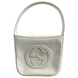 Borsa a mano Gucci in pelle vernice bianca con logo GG