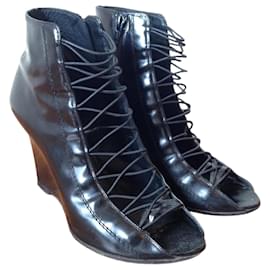 Botas Givenchy de cuña en cuero negro talla 39