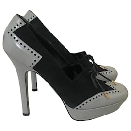 Gucci Pumps aus grauem Leder und schwarzem Wildleder Gr. 39