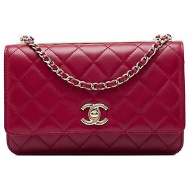 Portafoglio Chanel Red in agnello trapuntato Trendy CC con catena