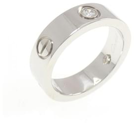 Anello Cartier Love con mezzo diamante