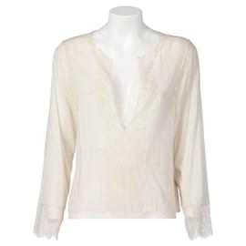 Camicetta in pizzo trasparente Gucci