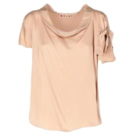 Blusa Marni con volantes y nudo frontal