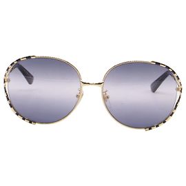 Gafas de sol Gucci GG0595S Bamboo de montura redonda en metal dorado