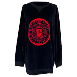 Balmain Samt-Pullover aus schwarzer Baumwolle mit Münzmotiv