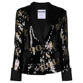 Blazer Moschino Couture con adornos de lentejuelas