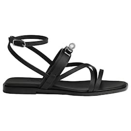 Sandali Gladiator June in pelle nera Hermès con finiture in palladio