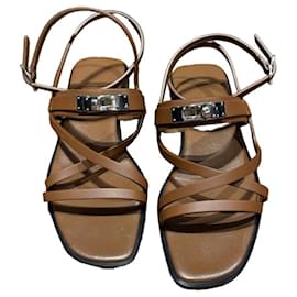 Sandali con listini in pelle marrone June di Hermès con dettagli argentati