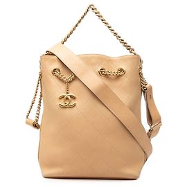 Chanel Borsa a secchiello On My Shoulder in pelle di vitello trapuntata Large CC beige