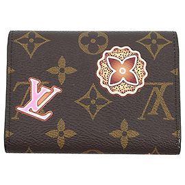 Portafoglio monete Rosalie Louis Vuitton Monogram Christmas Animation Candy Factory marrone